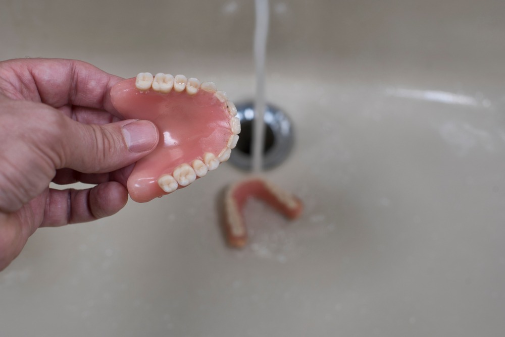 denture cleaning habits to make them last