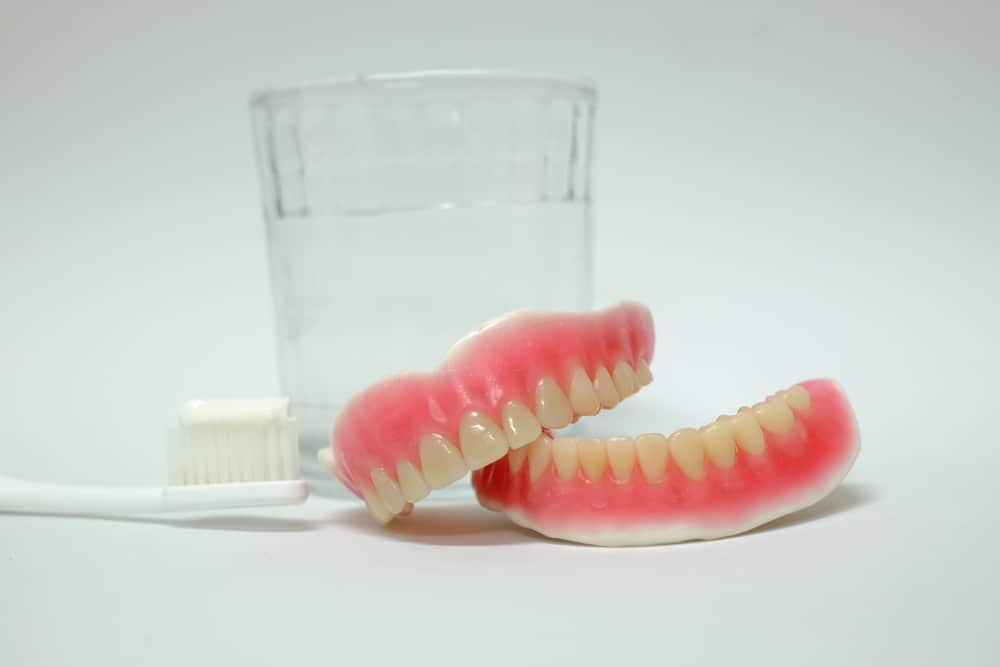 set of new complete dentures