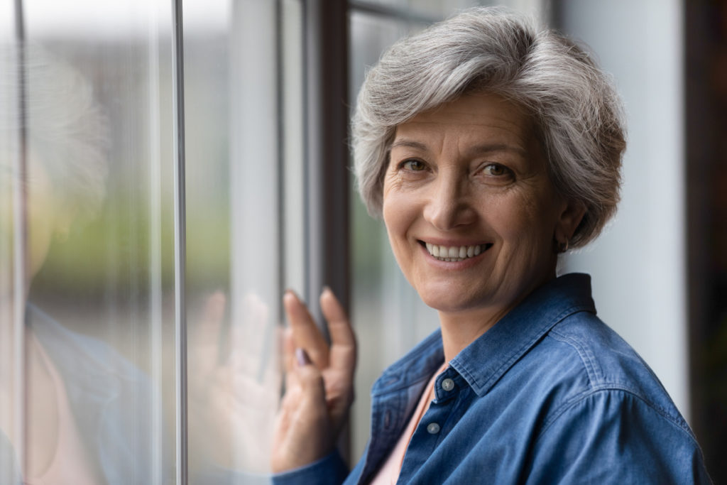 How Implant Dentures Help Oral Health & Everyday Comfort
